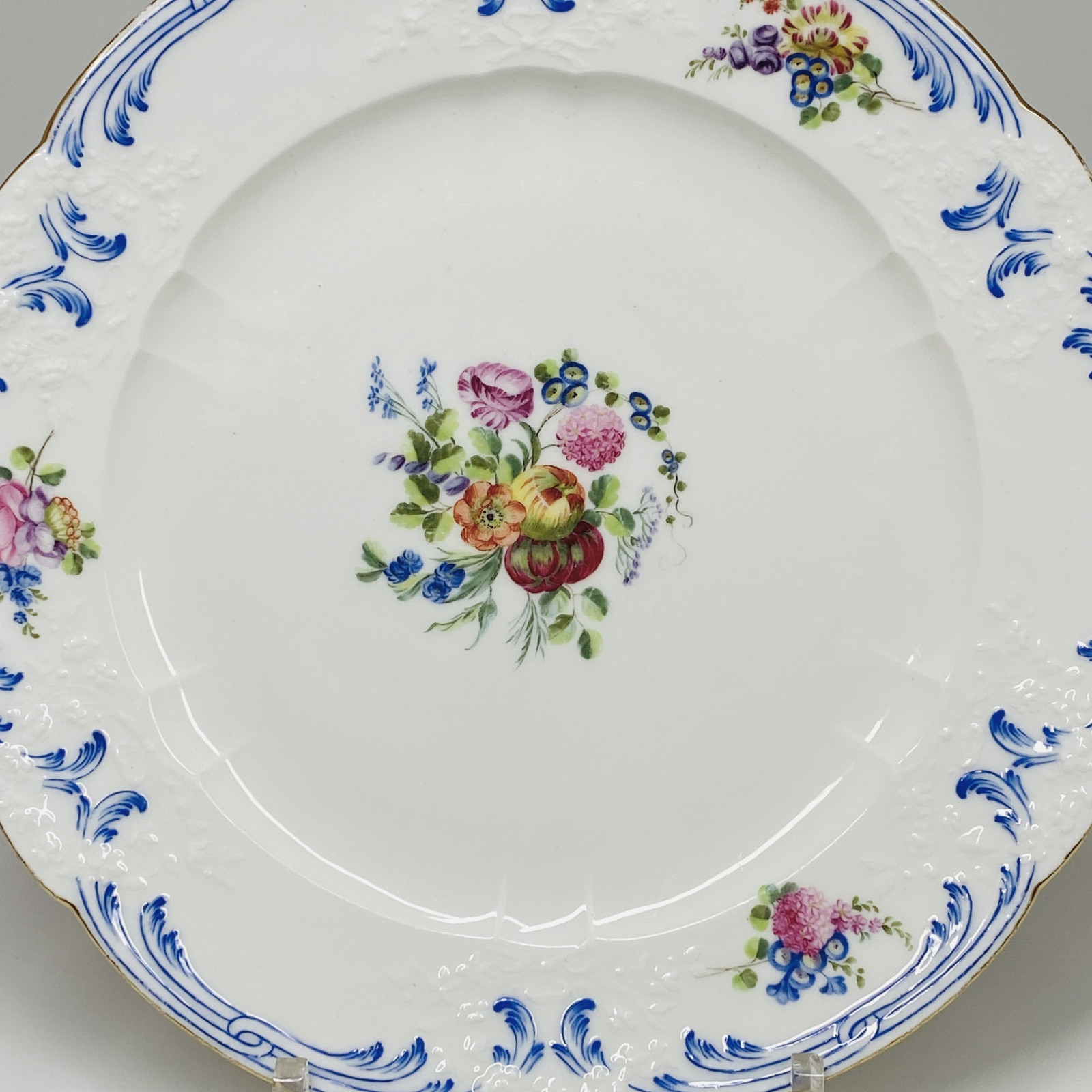 Sèvres - Plate decorated with bouquets of flowers and fruits - Eighteenth century