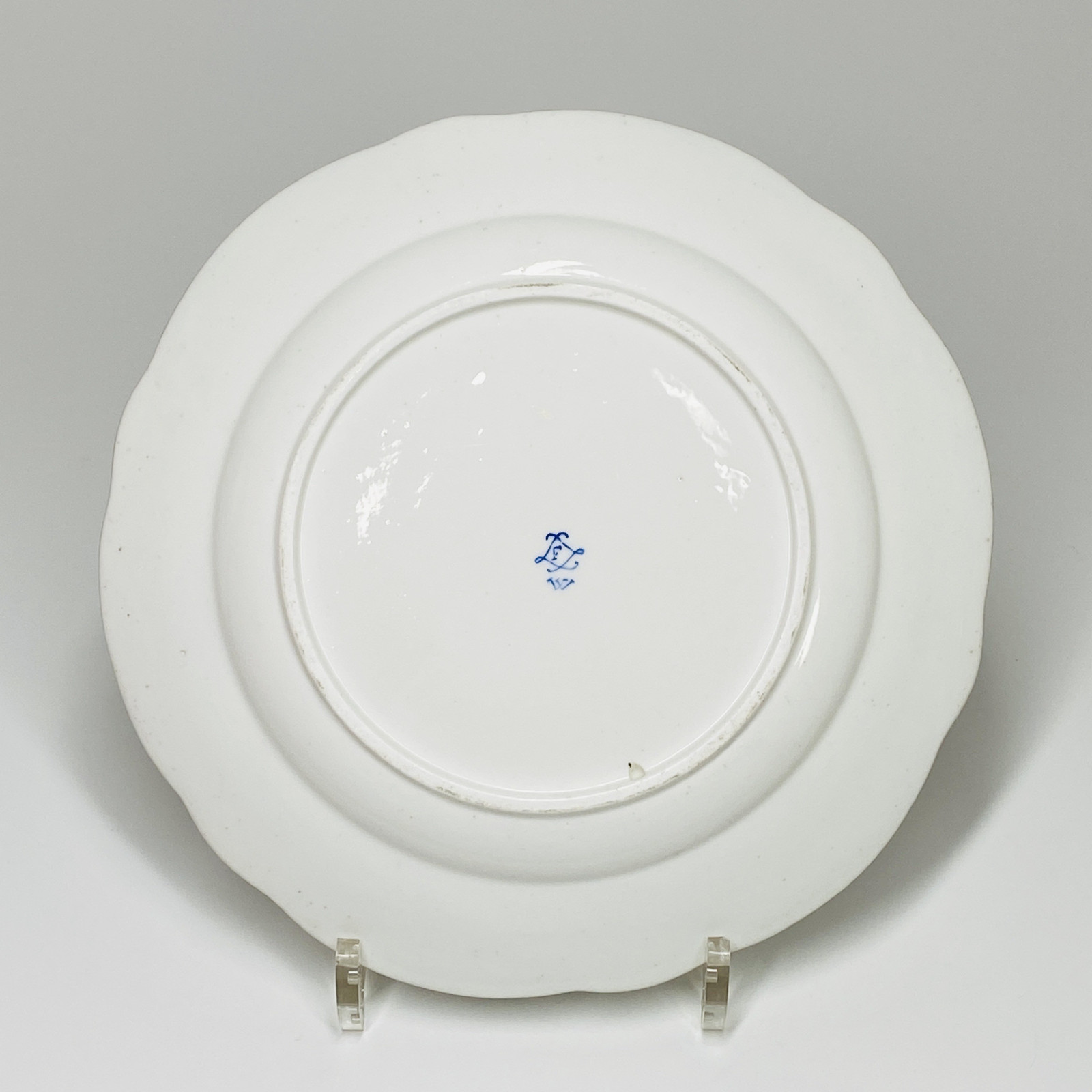 Sèvres - Plate decorated with bouquets of flowers dnd fruits - Eighteenth century