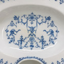 Moustiers - Plat à barbe à décor Bérain - XVIIIe siècle