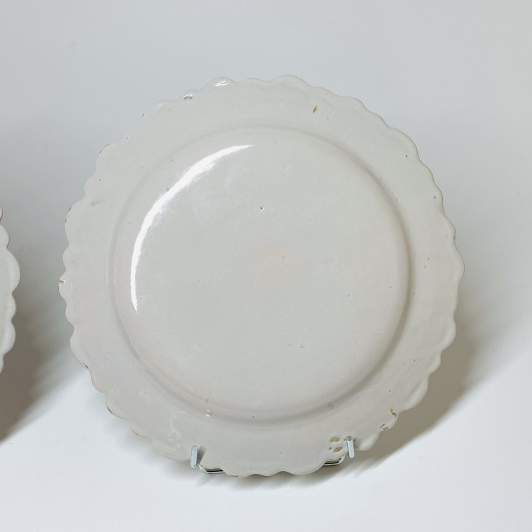 Pair of earthenware plates from Roanne - Eighteenth century